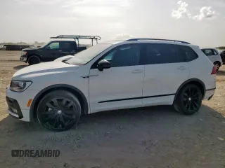 2021 Volkswagen Tiguan SE z VIN 3VV3B7AX9MM003432, wystawiony jako Copart lot #63422315 z przebiegiem 64 531 mil mil oraz Czysty tytuł • Clean title. Historia ofert i sprzedaży dostępna na DreamBid. Obrazek 1.