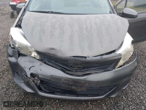 2013 Toyota Yaris L with VIN JTDJTUD39DD560766, listed as a IAAI auction lot 41031127 with 57,831 mi miles. Bid and sale history available at carsss.com. Image 6.