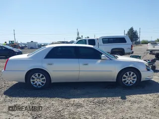 2008 Cadillac DTS 1SC with VIN 1G6KD57YX8U209792, listed as a IAAI auction lot 42003838 with 113,026 mi miles and . Bid and sale history available at carsss.com. Image 13.