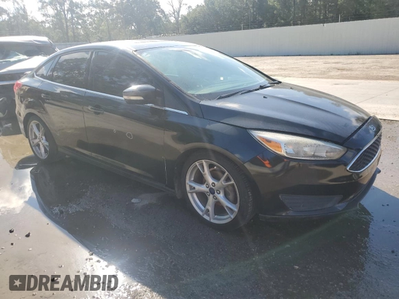2015 Ford Focus Titanium with VIN 1FADP3J29FL311471, listed as a Copart auction lot 87805235 with 195,026 mi miles and Salvage Title. Bid and sale history available at carsss.com. Image 4.