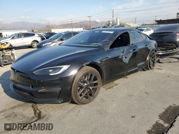 2022 Tesla Model S with VIN 5YJSA1E51NF482745, listed as a Copart auction lot 42562955 with 75,573 mi miles and Salvage Title. Bid and sale history available at DreamBid. Image 1.