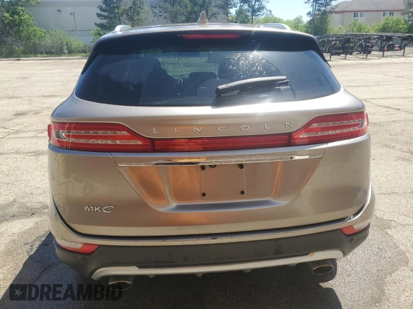 2019 Lincoln MKC Select with VIN 5LMCJ2D90KUL46326, listed as a Copart auction lot 57282045 with 99,181 mi miles and Clean title. Bid and sale history available at DreamBid. Image 6.