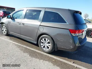 2016 Honda Odyssey EX-L with VIN 5FNRL5H6XGB020370, listed as a IAAI auction lot 41843941 with 189,980 mi miles. Bid and sale history available at carsss.com. Image 3.