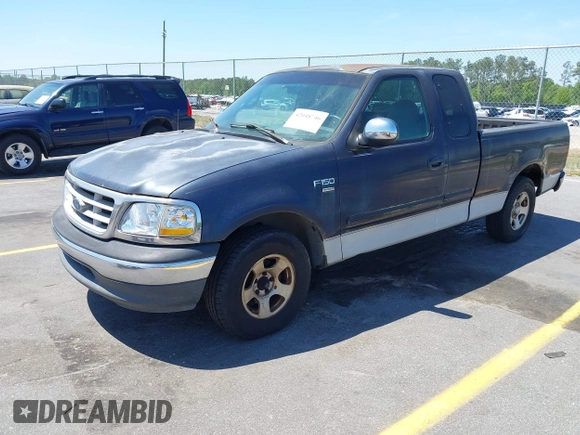 1999 Ford F-150 with VIN 1FTRX17W9XNB32397, listed as a IAAI auction lot 42048746 with 290,179 mi miles and . Bid and sale history available at DreamBid. Image 2.