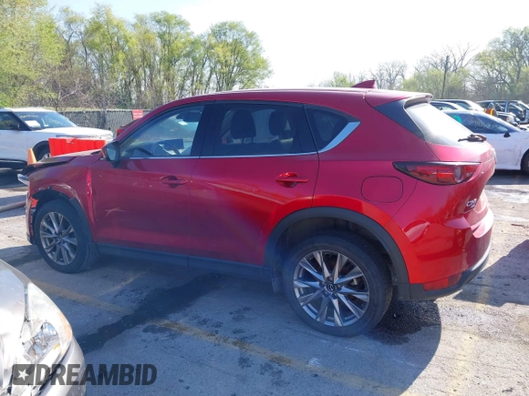 2021 Mazda CX-5 Grand Touring with VIN JM3KFBDM8M1390188, listed as a IAAI auction lot 42000444 with 84,908 mi miles. Bid and sale history available at carsss.com. Image 13.