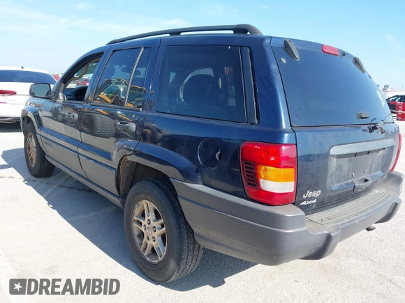 2004 Jeep Grand Cherokee Laredo with VIN 1J4GW48S54C415274, listed as a IAAI auction lot 42575334 with 172,932 mi miles and . Bid and sale history available at DreamBid. Image 3.