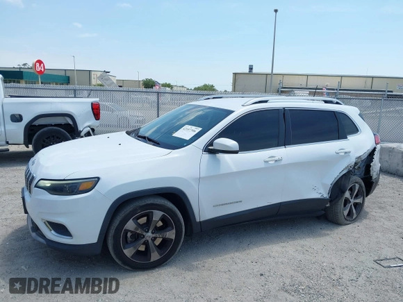 2019 Jeep Cherokee Limited with VIN 1C4PJLDB8KD402904, listed as a IAAI auction lot 42107306 with 96,677 mi miles and . Bid and sale history available at DreamBid. Image 14.