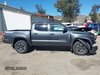 2023 Toyota Tacoma 4WD SR with VIN 3TMCZ5AN1PM600236, listed as a IAAI auction lot 41603152 with 35,956 mi miles. Bid and sale history available at carsss.com. Image 13.