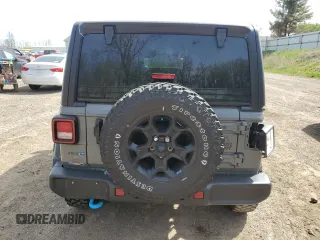 2023 Jeep Wrangler z VIN 1C4JJXN61PW623013, wystawiony jako Copart lot #54681425 z przebiegiem 26 574 mil mil oraz Czysty tytuł • Clean title. Historia ofert i sprzedaży dostępna na DreamBid. Obrazek 6.