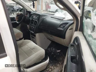 2012 Dodge Grand Caravan SXT with VIN 2C4RDGCG3CR405373, listed as a IAAI auction lot 41264407 with 164,019 mi miles and . Bid and sale history available at DreamBid. Image 5.