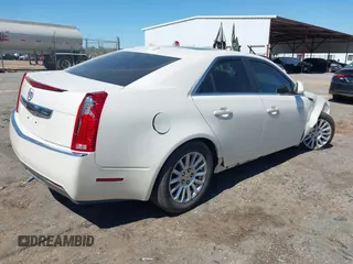 2012 Cadillac CTS z VIN 1G6DA5E51C0151324, wystawiony jako IAAI lot #41811207 z przebiegiem 100 407 mil mil oraz . Historia ofert i sprzedaży dostępna na DreamBid. Obrazek 4.