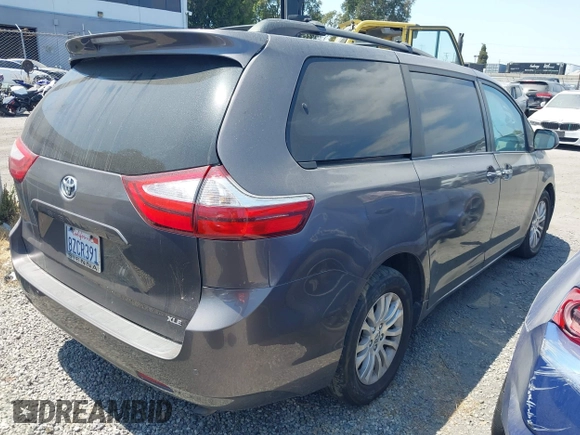 2015 Toyota Sienna XLE with VIN 5TDYK3DC2FS686969, listed as a IAAI auction lot 42559541 with 103,190 mi miles and . Bid and sale history available at DreamBid. Image 4.