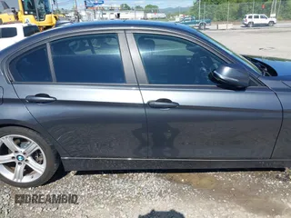 2014 BMW 3 Series 320i xDrive with VIN WBA3C3C54EP661409, listed as a IAAI auction lot 42182593 with 159,104 mi miles and . Bid and sale history available at DreamBid. Image 14.
