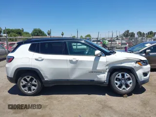 2018 Jeep Compass Limited z VIN 3C4NJCCB7JT410882, wystawiony jako IAAI lot #42536532 z przebiegiem 70 404 mil mil oraz . Historia ofert i sprzedaży dostępna na DreamBid. Obrazek 13.