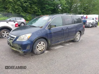 2005 Honda Odyssey EX-L with VIN 5FNRL38725B001662, listed as a IAAI auction lot 42693301 with 161,114 mi miles and . Bid and sale history available at DreamBid. Image 2.
