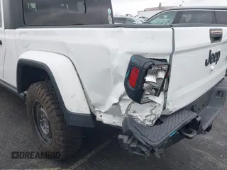2022 Jeep Gladiator Willys with VIN 1C6HJTAG1NL148524, listed as a IAAI auction lot 41507693 with 42,004 mi miles and . Bid and sale history available at DreamBid. Image 18.