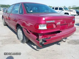 1995 Ford Taurus GL with VIN 1FALP52U8SA195242, listed as a IAAI auction lot 42634281 with 162,168 mi miles and . Bid and sale history available at DreamBid. Image 6.