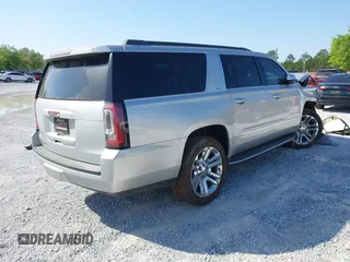 2018 GMC Yukon XL SLT with VIN 1GKS1GKC6JR113510, listed as a IAAI auction lot 42006987 with 161,389 mi miles and . Bid and sale history available at carsss.com. Image 4.