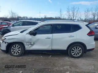 2017 Nissan Rogue S with VIN JN8AT2MVXHW017964, listed as a IAAI auction lot 41869965 with 123,544 mi miles and . Bid and sale history available at DreamBid. Image 15.