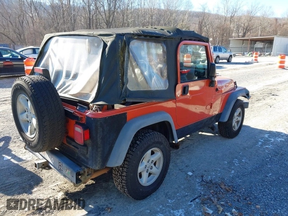 2006 Jeep Wrangler SE with VIN 1J4FA29S16P712101, listed as a IAAI auction lot 41347042 with 129,063 mi miles. Bid and sale history available at carsss.com. Image 4.