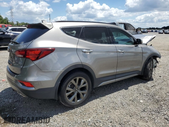 2017 Hyundai Santa Fe Ultimate z VIN 5XYZW4LA8HG491652, wystawiony jako Copart lot #56907985 z przebiegiem Nie podano mil oraz Szkoda całkowita • Salvage title. Historia ofert i sprzedaży dostępna na DreamBid. Obrazek 3.