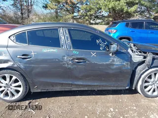 2014 Mazda 3 S Touring with VIN JM1BM1V37E1144331, listed as a IAAI auction lot 41880673 with 102,963 mi miles and . Bid and sale history available at DreamBid. Image 14.