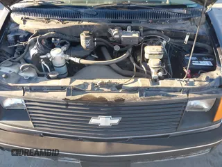 1991 Chevrolet Astro with VIN 1GNDM19Z2MB123653, listed as a IAAI auction lot 41388286 with 175,009 mi miles. Bid and sale history available at carsss.com. Image 10.