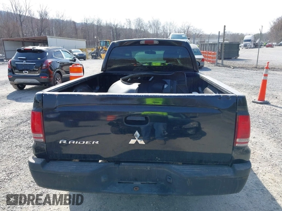 2006 Mitsubishi Raider LS with VIN 1Z7HC22K56S561574, listed as a IAAI auction lot 41757412 with 216,559 mi miles. Bid and sale history available at carsss.com. Image 16.