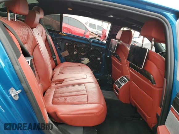 2019 BMW 7 Series 750i z VIN WBA7F0C51KGM25707, wystawiony jako Copart lot #61950495 z przebiegiem 56 768 mil mil oraz Nie do naprawy • Non repairable. Historia ofert i sprzedaży dostępna na DreamBid. Obrazek 10.