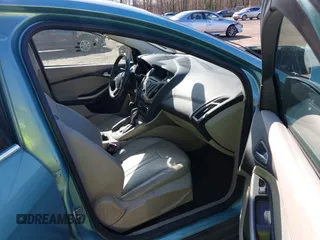 2012 Ford Focus SEL with VIN 1FAHP3H25CL172958, listed as a IAAI auction lot 41961889 with 135,052 mi miles. Bid and sale history available at carsss.com. Image 5.