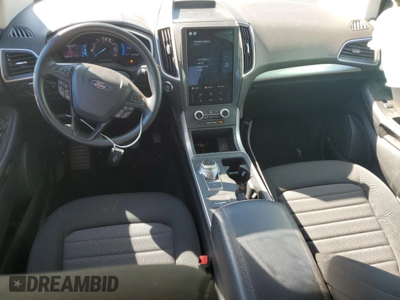 2021 Ford Edge SE z VIN 2FMPK4G98MBA23711, wystawiony jako Copart lot #76259054 z przebiegiem 20 879 mil mil oraz Czysty tytuł • Clean title. Historia ofert i sprzedaży dostępna na DreamBid. Obrazek 8.