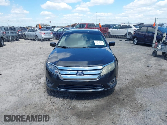 2012 Ford Fusion SE z VIN 3FAHP0HG8CR339020, wystawiony jako IAAI lot #41962046 z przebiegiem 136 072 mil mil oraz . Historia ofert i sprzedaży dostępna na DreamBid. Obrazek 12.