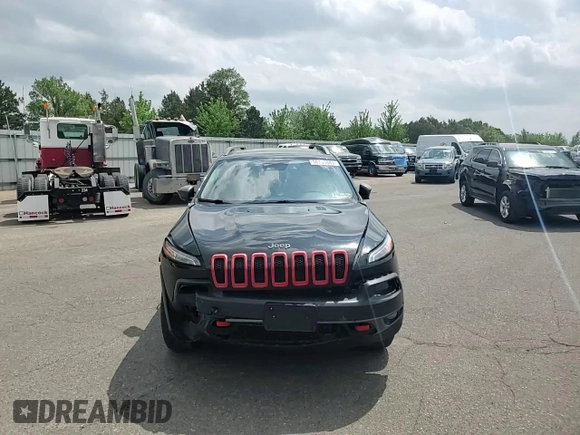 2014 Jeep Cherokee Trailhawk with VIN 1C4PJMBSXEW187981, listed as a Copart auction lot 56711885 with 157,317 mi miles and Salvage title. Bid and sale history available at DreamBid. Image 14.