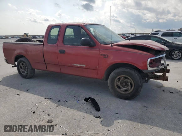 2004 Ford F-150 XL with VIN 2FTRX17W64CA79272, listed as a Copart auction lot 59186965 with 170,512 mi miles and Salvage title. Bid and sale history available at DreamBid. Image 4.