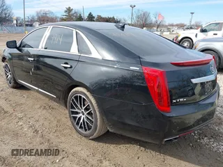 2015 Cadillac XTS Luxury z VIN 2G61N5S35F9155543, wystawiony jako IAAI lot #41699914 z przebiegiem 120 700 mil mil oraz . Historia ofert i sprzedaży dostępna na DreamBid. Obrazek 3.