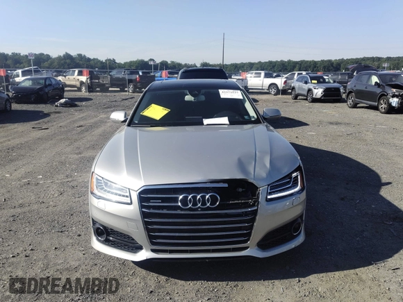 2017 Audi A8 with VIN WAU44AFD3HN014802, listed as a IAAI auction lot 42573537 with 121,096 mi miles and . Bid and sale history available at DreamBid. Image 12.