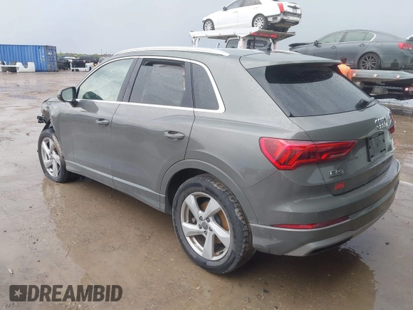 2020 Audi Q3 Premium z VIN WA1AECF30L1052472, wystawiony jako IAAI lot #41886809 z przebiegiem 101 600 mil mil oraz . Historia ofert i sprzedaży dostępna na DreamBid. Obrazek 3.