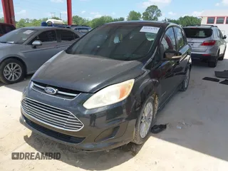 2013 Ford C-Max SE z VIN 1FADP5AUXDL511432, wystawiony jako IAAI lot #42314733 z przebiegiem 140 616 mil mil oraz . Historia ofert i sprzedaży dostępna na DreamBid. Obrazek 17.
