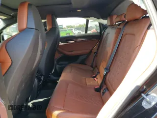 2022 BMW X4 M z VIN 5YM23EC02N9K93385, wystawiony jako Copart lot #53954854 z przebiegiem 17 189 mil mil oraz . Historia ofert i sprzedaży dostępna na DreamBid. Obrazek 11.