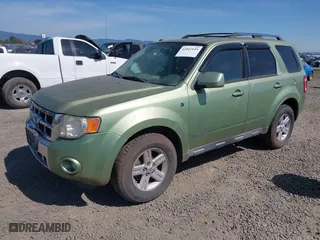 2008 Ford Escape Hybrid with VIN 1FMCU59H68KB66414, listed as a IAAI auction lot 42047695 with 234,039 mi miles. Bid and sale history available at carsss.com. Image 2.