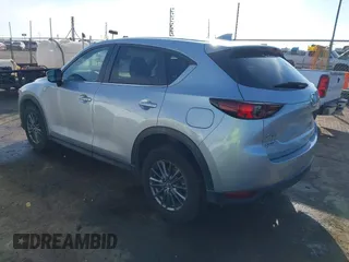 2020 Mazda CX-5 Touring with VIN JM3KFACM1L0789394, listed as a IAAI auction lot 41565887 with 73,730 mi miles. Bid and sale history available at carsss.com. Image 3.