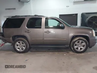 2011 GMC Yukon SLT with VIN 1GKS2CE07BR213141, listed as a IAAI auction lot 41674842 with 226,151 mi miles. Bid and sale history available at carsss.com. Image 13.