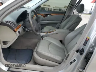 2003 Mercedes-Benz E-Class 5.0L with VIN WDBUF70J03A112909, listed as a Copart auction lot 49924865 with 158,244 mi miles and Salvage Title. Bid and sale history available at carsss.com. Image 7.