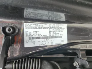 2016 Ford Focus SE z VIN 1FADP3F28GL267618, wystawiony jako Copart lot #58920765 z przebiegiem 157 980 mil mil oraz Szkoda całkowita • Salvage title. Historia ofert i sprzedaży dostępna na DreamBid. Obrazek 12.