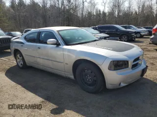 2010 Dodge Charger SXT with VIN 2B3CA3CV5AH233504, listed as a Copart auction lot 51800395 with 253,535 mi miles and Salvage Title. Bid and sale history available at carsss.com. Image 4.