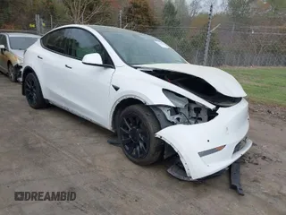 2020 Tesla Model Y Long Range with VIN 5YJYGDEE5LF037156, listed as a IAAI auction lot 41729398 with 102,907 mi miles and . Bid and sale history available at DreamBid. Image 1.