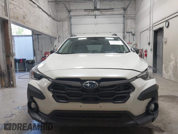 2024 Subaru Crosstrek Premium z VIN JF2GUADC0R8299759, wystawiony jako IAAI lot #42483847 z przebiegiem 12 663 mil mil oraz . Historia ofert i sprzedaży dostępna na DreamBid. Obrazek 13.