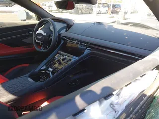 2024 Aston Martin DB12 z VIN SCFRMFGWXRGM13607, wystawiony jako IAAI lot #41380304 z przebiegiem Nie podano mil oraz . Historia ofert i sprzedaży dostępna na DreamBid. Obrazek 5.