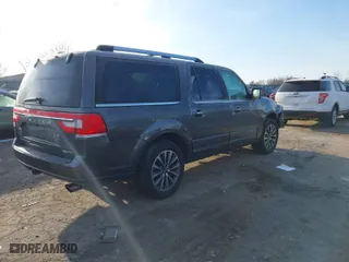 2015 Lincoln Navigator L with VIN 5LMJJ3JT3FEJ13389, listed as a IAAI auction lot 41205754 with 117,883 mi miles. Bid and sale history available at carsss.com. Image 4.