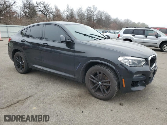 2020 BMW X4 xDrive30i z VIN 5UX2V1C08L9B97027, wystawiony jako Copart lot #50574175 z przebiegiem 124 221 mil mil oraz Szkoda całkowita • Salvage title. Historia ofert i sprzedaży dostępna na DreamBid. Obrazek 4.